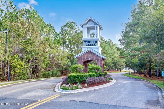 3592 Harrier Ct, Middleburg, FL 32068 - view of asphalt street with street lights and curbs