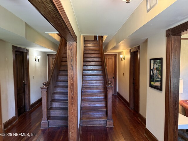 5 Palm Row, Saint Augustine, FL 32084 - staircase featuring hardwood / wood-style flooring and baseboards