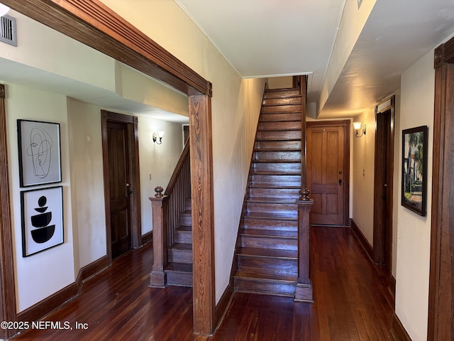 5 Palm Row, Saint Augustine, FL 32084 - stairs featuring hardwood / wood-style floors and baseboards