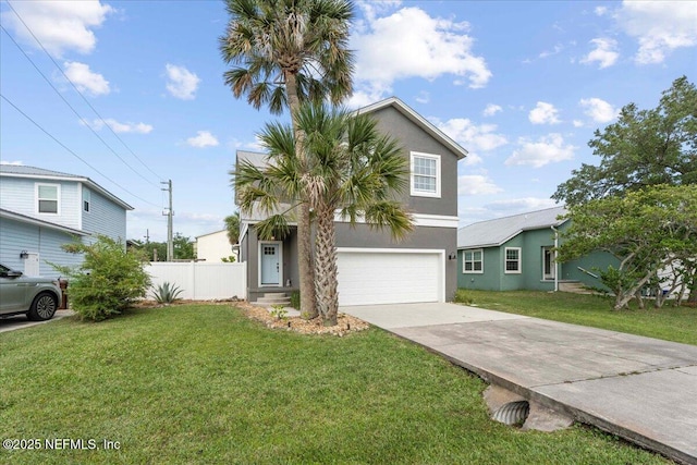 28 S Comares Ave, Saint Augustine Beach, FL 32080 - view of front of home featuring a garage, driveway, and stucco siding