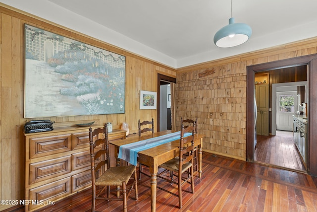 4524 Post St, Jacksonville, FL 32205 - dining room featuring wood walls and wood-type flooring