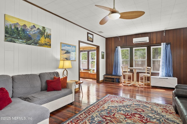4524 Post St, Jacksonville, FL 32205 - living area with a wall mounted air conditioner, wood walls, hardwood / wood-style flooring, a ceiling fan, and ornamental molding