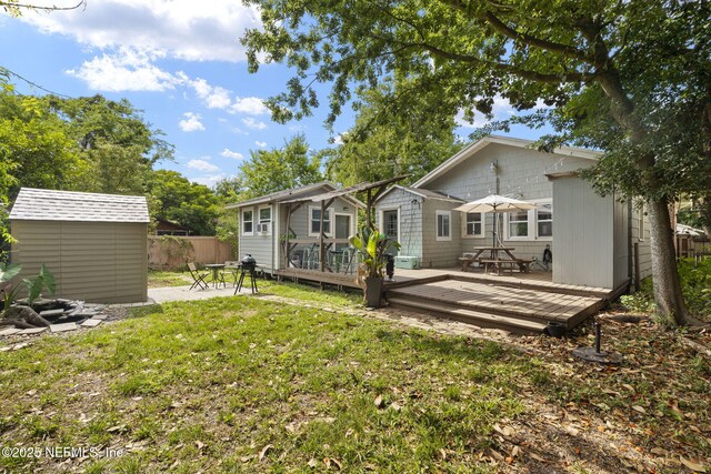 4524 Post St, Jacksonville, FL 32205 - back of property with a wooden deck