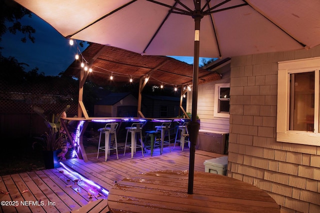 4524 Post St, Jacksonville, FL 32205 - deck at night featuring outdoor dining area