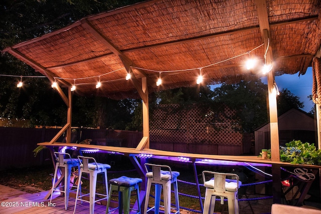 4524 Post St, Jacksonville, FL 32205 - patio at twilight featuring a fenced backyard