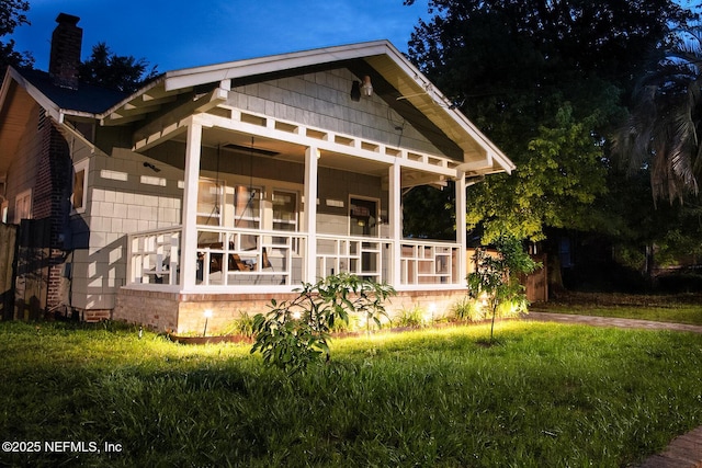 4524 Post St, Jacksonville, FL 32205 - view of front of house featuring a chimney and a porch
