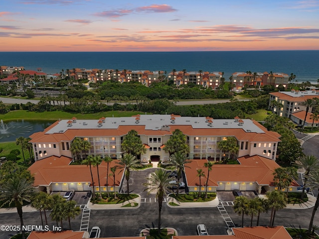 310 S Ocean Grande Dr Unit 205, Ponte Vedra Beach, FL 32082 - drone / aerial view of a nearby body of water and apartment complex