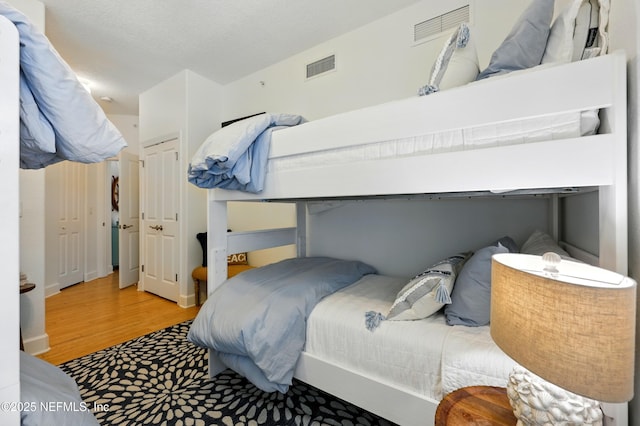 310 S Ocean Grande Dr Unit 205, Ponte Vedra Beach, FL 32082 - bedroom featuring wood finished floors