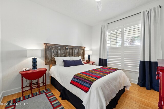 310 S Ocean Grande Dr Unit 205, Ponte Vedra Beach, FL 32082 - bedroom with wood finished floors and baseboards