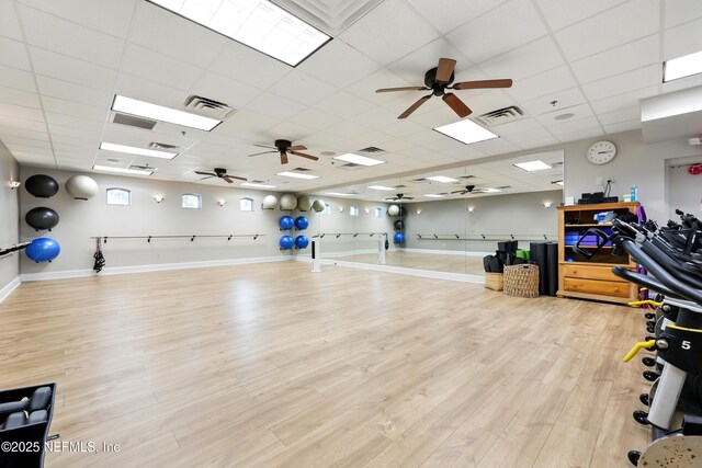 310 S Ocean Grande Dr Unit 205, Ponte Vedra Beach, FL 32082 - exercise area with light wood-type flooring, ceiling fan, and a drop ceiling