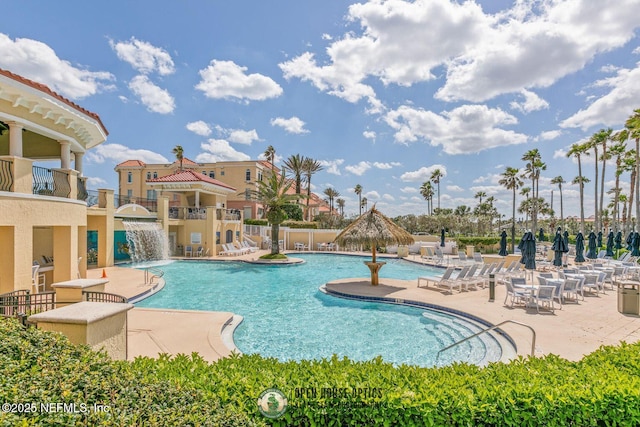 310 S Ocean Grande Dr Unit 205, Ponte Vedra Beach, FL 32082 - community pool with a patio area