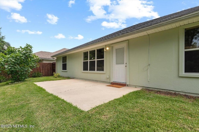 2888 Majestic Oaks Ln, Green Cove Springs, FL 32043 - rear view of house with a patio and stucco siding