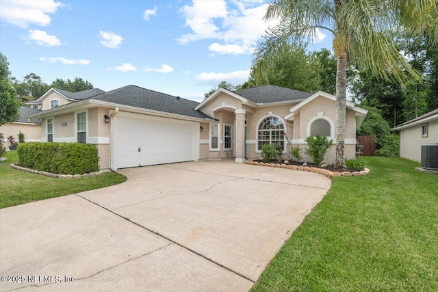 2888 Majestic Oaks Ln, Green Cove Springs, FL 32043 - ranch-style home featuring driveway, a garage, and stucco siding