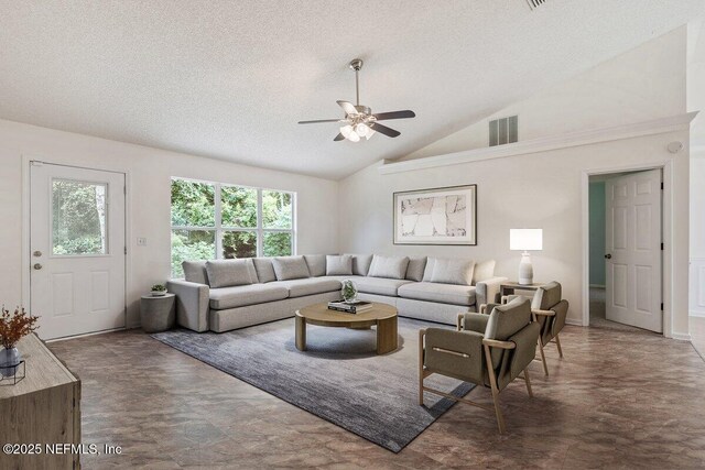 2888 Majestic Oaks Ln, Green Cove Springs, FL 32043 - living room featuring a ceiling fan, a textured ceiling, and vaulted ceiling