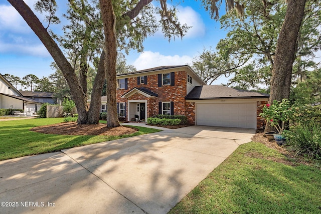 2808 Scott Mill Estates Dr, Jacksonville, FL 32257 - view of front of home with brick siding, driveway, an attached garage, and a front yard