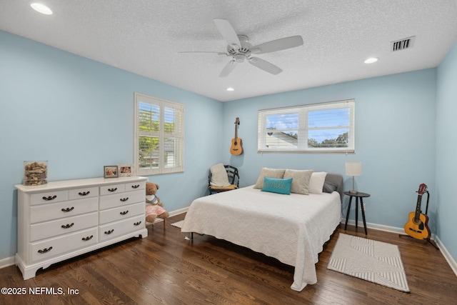 2808 Scott Mill Estates Dr, Jacksonville, FL 32257 - bedroom featuring dark wood finished floors, baseboards, a ceiling fan, a textured ceiling, and recessed lighting