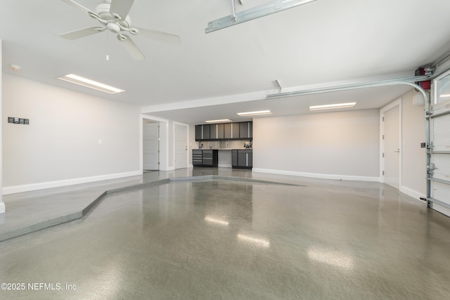 365 8th St, Atlantic Beach, FL 32233 - garage with baseboards and ceiling fan