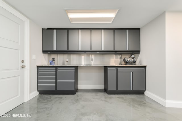 365 8th St, Atlantic Beach, FL 32233 - bar area featuring baseboards and finished concrete flooring