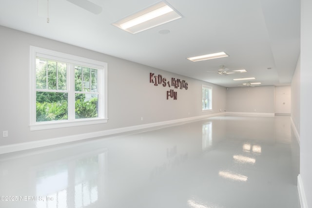 365 8th St, Atlantic Beach, FL 32233 - empty room featuring a ceiling fan and healthy amount of natural light