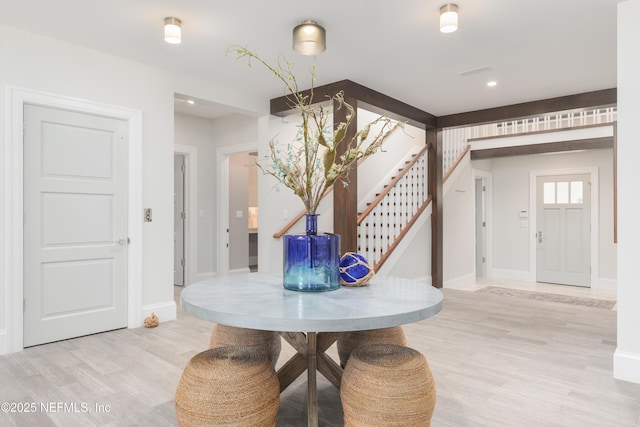 365 8th St, Atlantic Beach, FL 32233 - foyer with stairway and light wood-style flooring