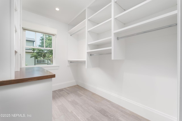 365 8th St, Atlantic Beach, FL 32233 - spacious closet featuring light wood-style floors