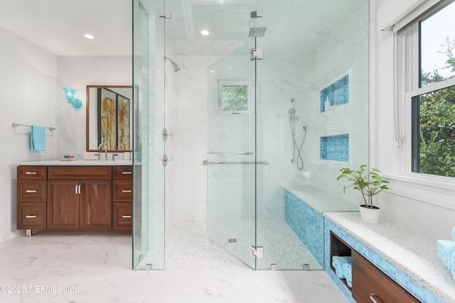 365 8th St, Atlantic Beach, FL 32233 - bathroom featuring a marble finish shower, vanity, and marble finish flooring