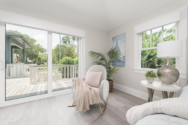 365 8th St, Atlantic Beach, FL 32233 - sitting room featuring baseboards and wood finished floors