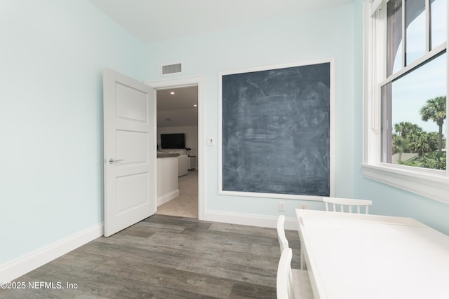 365 8th St, Atlantic Beach, FL 32233 - bedroom with multiple windows and wood finished floors