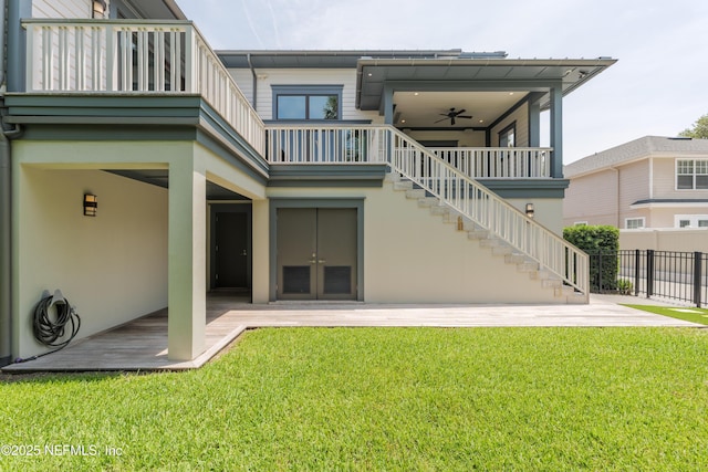 365 8th St, Atlantic Beach, FL 32233 - rear view of house featuring stairs, a ceiling fan, and stucco siding