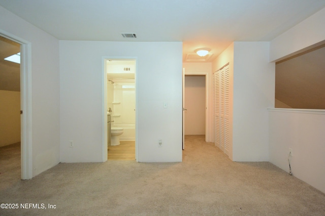 1266 Mayport Landing Cir, Jacksonville, FL 32233 - unfurnished bedroom with carpet flooring, a closet, and ensuite bathroom