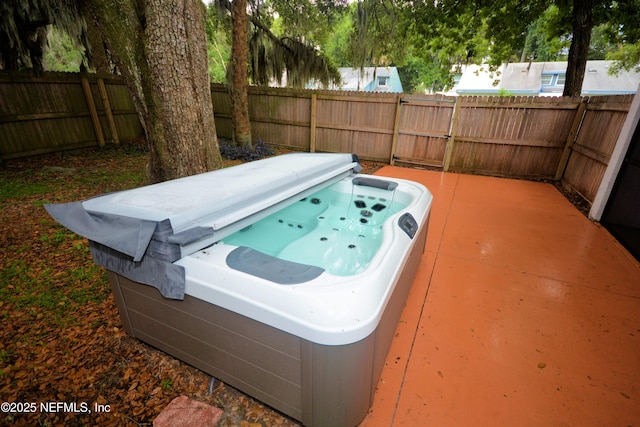 1266 Mayport Landing Cir, Jacksonville, FL 32233 - view of swimming pool featuring a hot tub and a fenced backyard