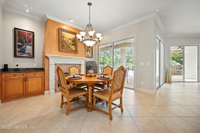 218 Sophia Ter, Saint Augustine, FL 32095 - dining area with a chandelier, light tile patterned floors, crown molding, and baseboards
