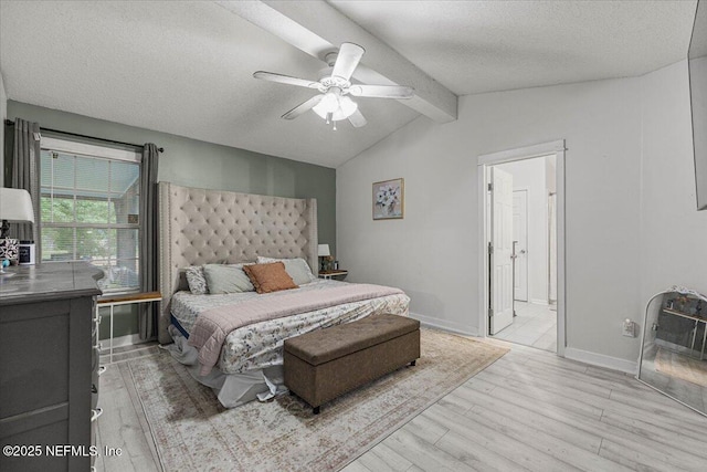 11214 Bentley Trace Ln E, Jacksonville, FL 32257 - bedroom featuring light wood-type flooring, a textured ceiling, baseboards, a ceiling fan, and ensuite bath