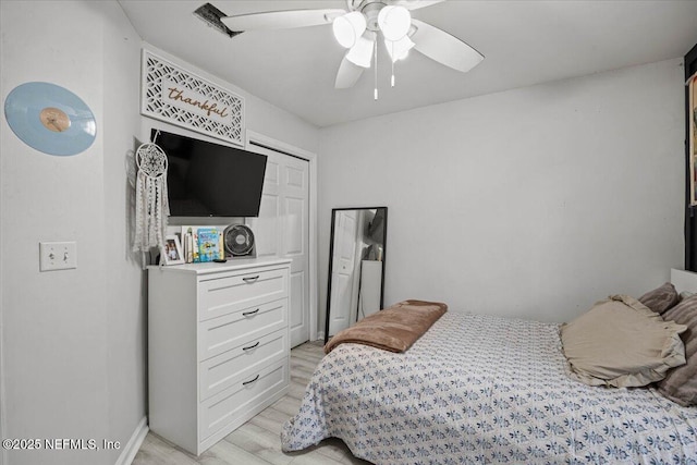 11214 Bentley Trace Ln E, Jacksonville, FL 32257 - bedroom featuring light wood finished floors and ceiling fan