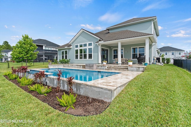46 Hydrilla Ct, Saint Augustine, FL 32095 - rear view of house with a fenced backyard, a patio area, and a shingled roof