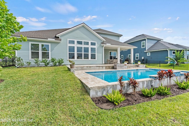 46 Hydrilla Ct, Saint Augustine, FL 32095 - rear view of house featuring a fenced backyard, a patio area, and roof with shingles