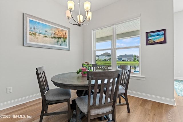 46 Hydrilla Ct, Saint Augustine, FL 32095 - dining room with a chandelier and wood finished floors