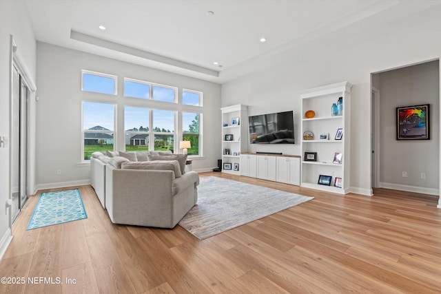 46 Hydrilla Ct, Saint Augustine, FL 32095 - living area featuring light wood-style flooring, recessed lighting, and a high ceiling
