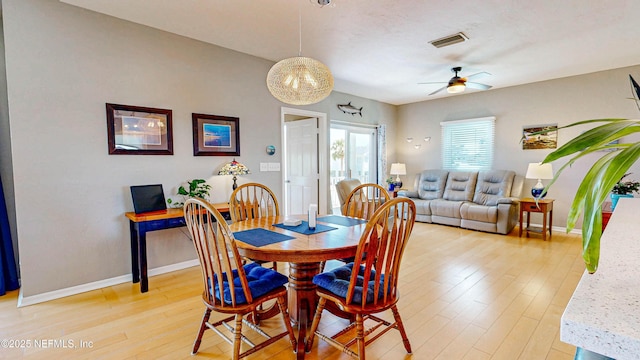 23 Moody Dr, Palm Coast, FL 32137 - dining area with light wood-style floors, ceiling fan, and baseboards