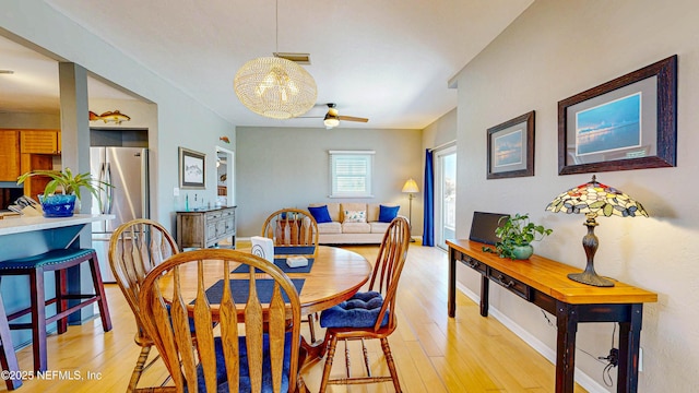 23 Moody Dr, Palm Coast, FL 32137 - dining area with light wood finished floors, ceiling fan, and baseboards