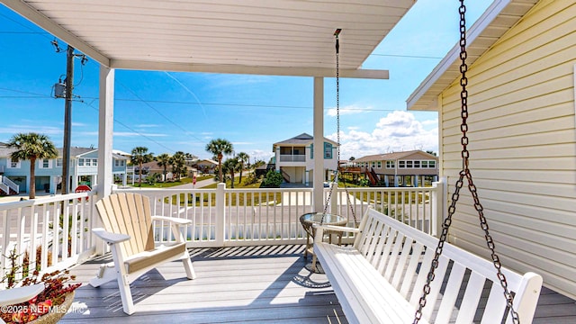 23 Moody Dr, Palm Coast, FL 32137 - wooden deck with a residential view