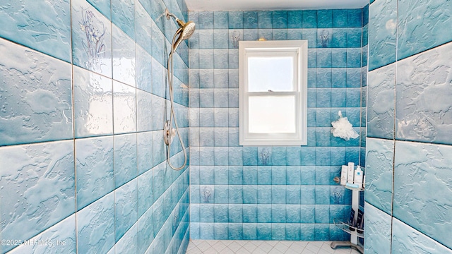 23 Moody Dr, Palm Coast, FL 32137 - bathroom featuring tiled shower and tile patterned flooring