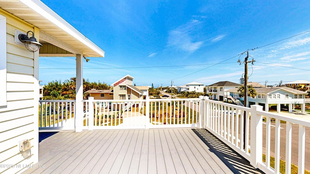 23 Moody Dr, Palm Coast, FL 32137 - wooden deck with a residential view