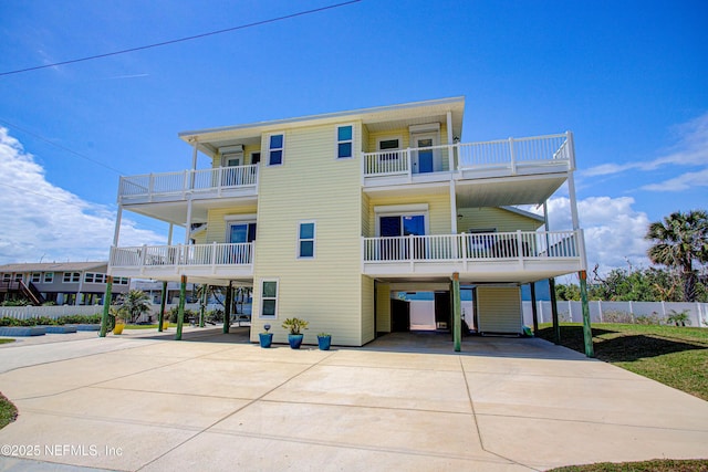 23 Moody Dr, Palm Coast, FL 32137 - view of property with driveway and a carport