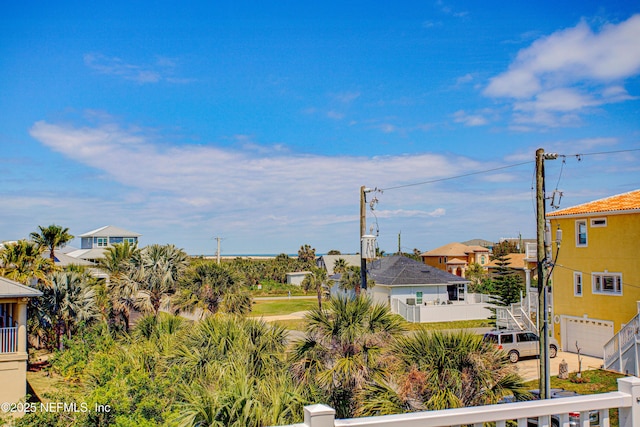 23 Moody Dr, Palm Coast, FL 32137 - view of yard featuring a residential view and a garage
