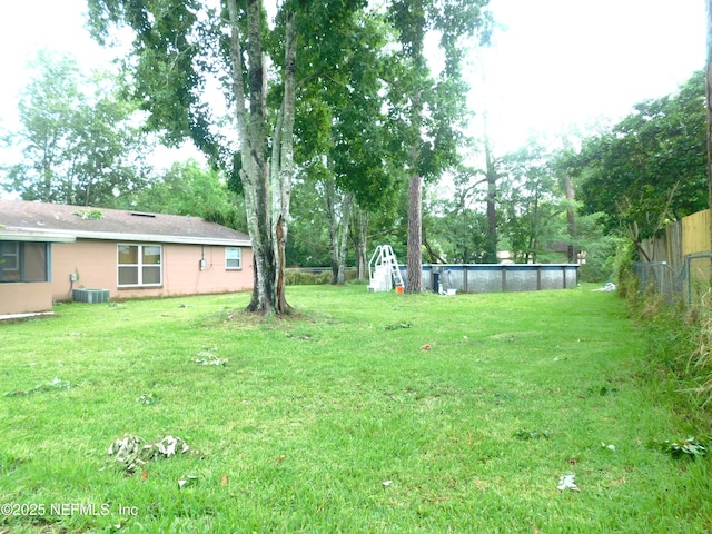 2718 Tina Ln, Middleburg, FL 32068 - view of yard with central AC and view of wooded area