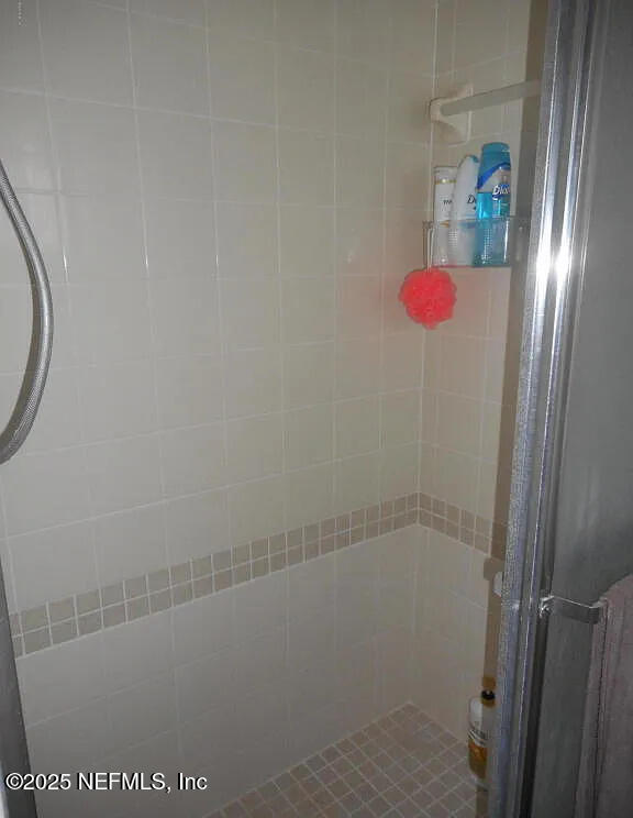 7670 SW 112th Ln, Ocala, FL 34476 - full bath with a shower stall