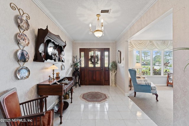 2364 Smullian Trl S, Jacksonville, FL 32217 - entryway featuring a chandelier, crown molding, baseboards, a textured ceiling, and tile patterned flooring