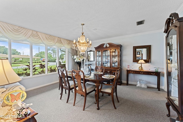 2364 Smullian Trl S, Jacksonville, FL 32217 - carpeted dining space with a chandelier, baseboards, ornamental molding, and a textured ceiling