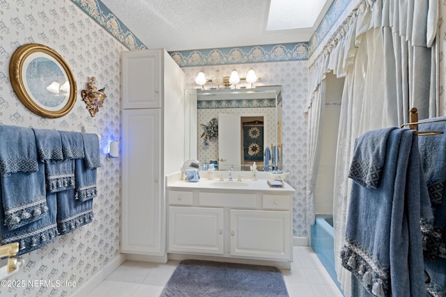 2364 Smullian Trl S, Jacksonville, FL 32217 - full bath featuring wallpapered walls, tile patterned floors, vanity, shower / bath combo, and a textured ceiling